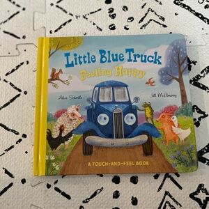 Little Blue Feeling Happy Book (touch and feel), like new